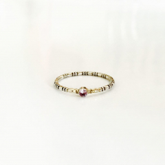 Zilveren ring met gouden accenten en synthetische alexandriet