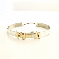 Zilveren armband met gouden plaatjes en diamant